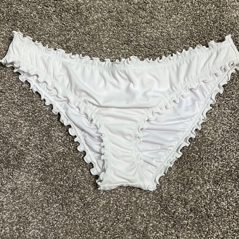 White bathing suit bottoms with a scrunched butt